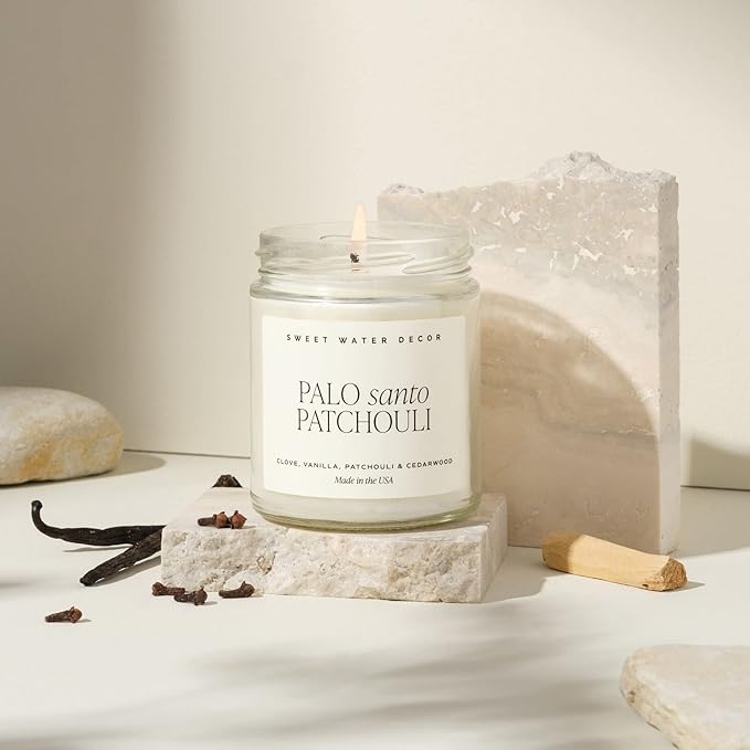Sweet Water Decor Palo Santo Patchouli Candle - Soy Clove, Vanilla, Patchouli, Cedarwood Scented Spa Candles for Home -9oz Clear Jar + Gold Lid, 40+ Hour Burn Time, Made in The USA - Bloomnest