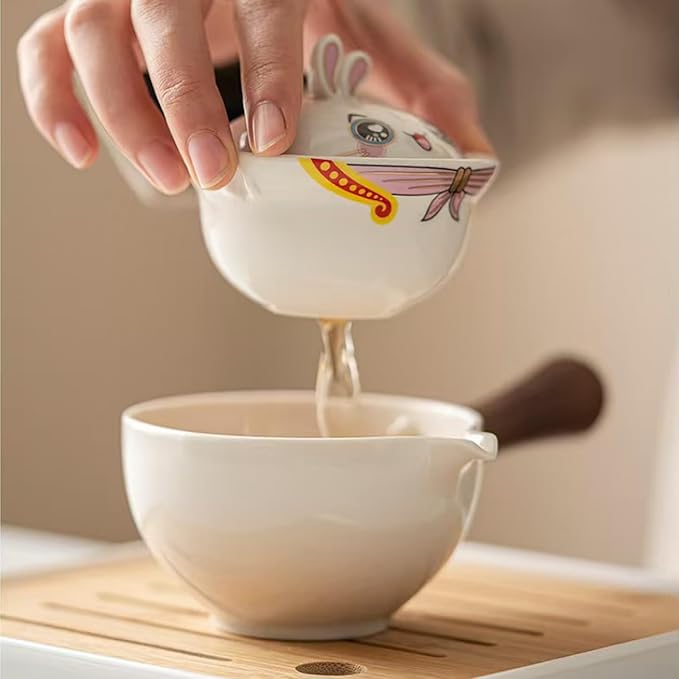 Ceramic Portable Travel Tea Set, Chinese Kungfu Tea Set with 360 Rotation Teapot and Infuser, 4 Tea Cups, Tea Tray And Travel Bag (Lovely Rabbit)