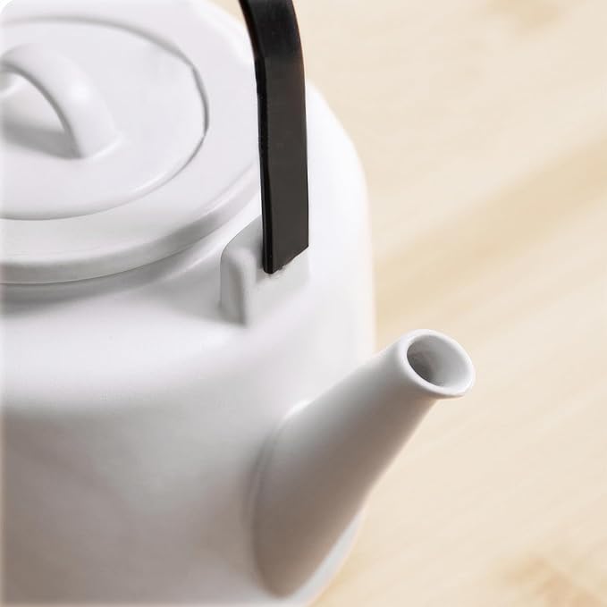 Small Stove Safe Ceramic Teapot with Cold Touch Curved Handle (27oz) - Hand-Glazed Finish - Suitable for Boiling Water and a Variety of Teas and Herbs - Matte Black-White - Bloomnest