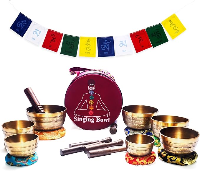 Khusi Tibetan singing bowls chakra sets, hand carved buddha mantra and symbol, sets of seven divine sound bowl. Khusi+Inc