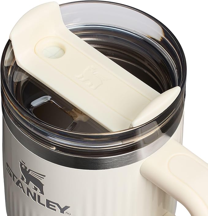 STANLEY Quencher H2.0 Tumbler with Handle and Straw 20 oz | Flowstate 3-Position Lid | Cup Holder Compatible for Travel | Insulated Stainless Steel Cup | BPA-Free | Fluted Cream Gloss Stanley