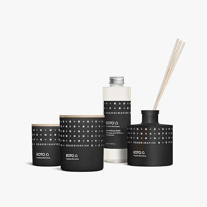 Skandinavisk KOTO 'Home' Mini Scented Candle. Fragrance Notes: Vanilla Beans and Dried Orange Peel, Amber and Leather. 2.3 oz. - Bloomnest