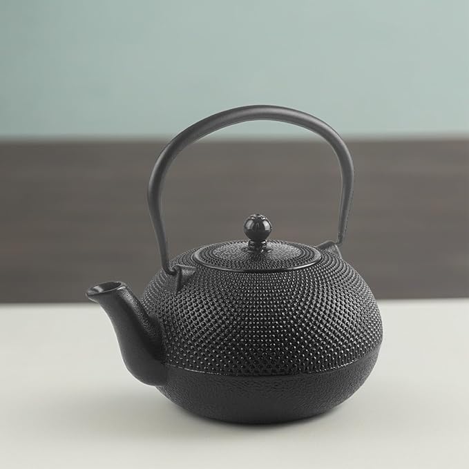 IBILI 40 Oz Cast Iron Teapot with Infuser | Made in Spain | Hammered Texture, Enameled Interior, Stovetop & Induction Compatible, Japanese Kettle for Loose Leaf Tea, Tetsubin Design, Black - Bloomnest