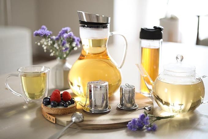 Teabloom Elegant Stainless Steel Loose Leaf Tea Infuser – Tea Connoisseur's Choice for White, Green, Oolong, Black, and Herbal Teas – Geometric Blossom Design – Small Size - Bloomnest