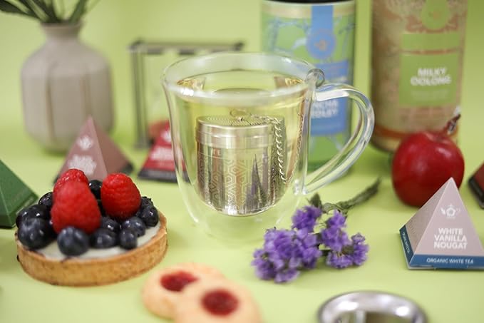 Teabloom Elegant Stainless Steel Loose Leaf Tea Infuser – Tea Connoisseur's Choice for White, Green, Oolong, Black, and Herbal Teas – Geometric Blossom Design – Small Size - Bloomnest