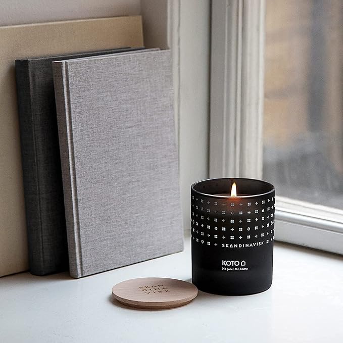 Skandinavisk KOTO 'Home' Mini Scented Candle. Fragrance Notes: Vanilla Beans and Dried Orange Peel, Amber and Leather. 2.3 oz. - Bloomnest