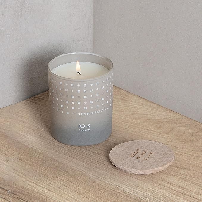 Skandinavisk RO 'Tranquility' Scented Candle. Fragrance Notes: Cut Grasses and Fallen Leaves, Cucumber and Wild Violets. 7.0 oz. - Bloomnest
