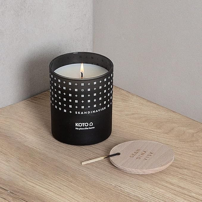 Skandinavisk KOTO 'Home' Mini Scented Candle. Fragrance Notes: Vanilla Beans and Dried Orange Peel, Amber and Leather. 2.3 oz. - Bloomnest