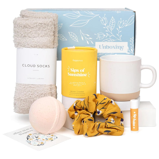 Unboxme Sunshine Gift For Women | Self Care Package with organic herbal tea, fluffy cloud socks, ceramic mug, citrus bath bomb , beeswax lip balm, a fun floral scrunchie + a sending hugs card