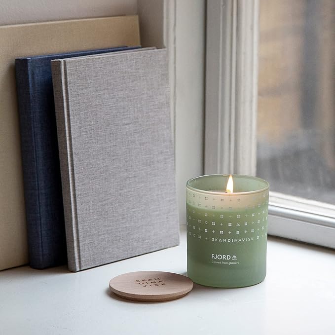 Skandinavisk Fjord Scented Candle. Fragrance Notes: Apple and Pear Blossom, Orchard Fruits and Redcurrants. 7.0 oz. - Bloomnest