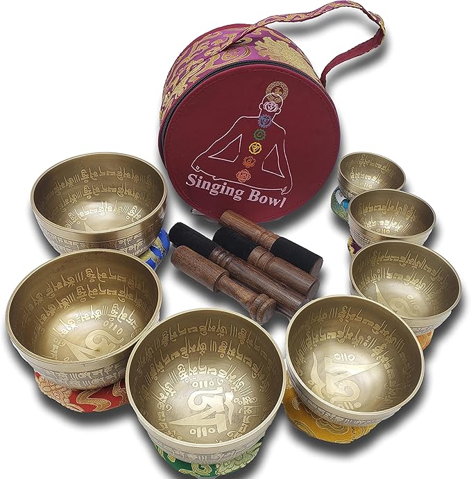 Khusi Tibetan singing bowls chakra sets, hand carved buddha mantra and symbol, sets of seven divine sound bowl. Khusi+Inc