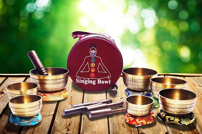 Khusi Tibetan singing bowls chakra sets, hand carved buddha mantra and symbol, sets of seven divine sound bowl. Khusi+Inc